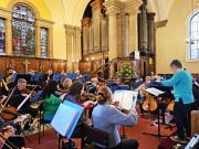 Orchestra rehearsing in Melrose Parish Church